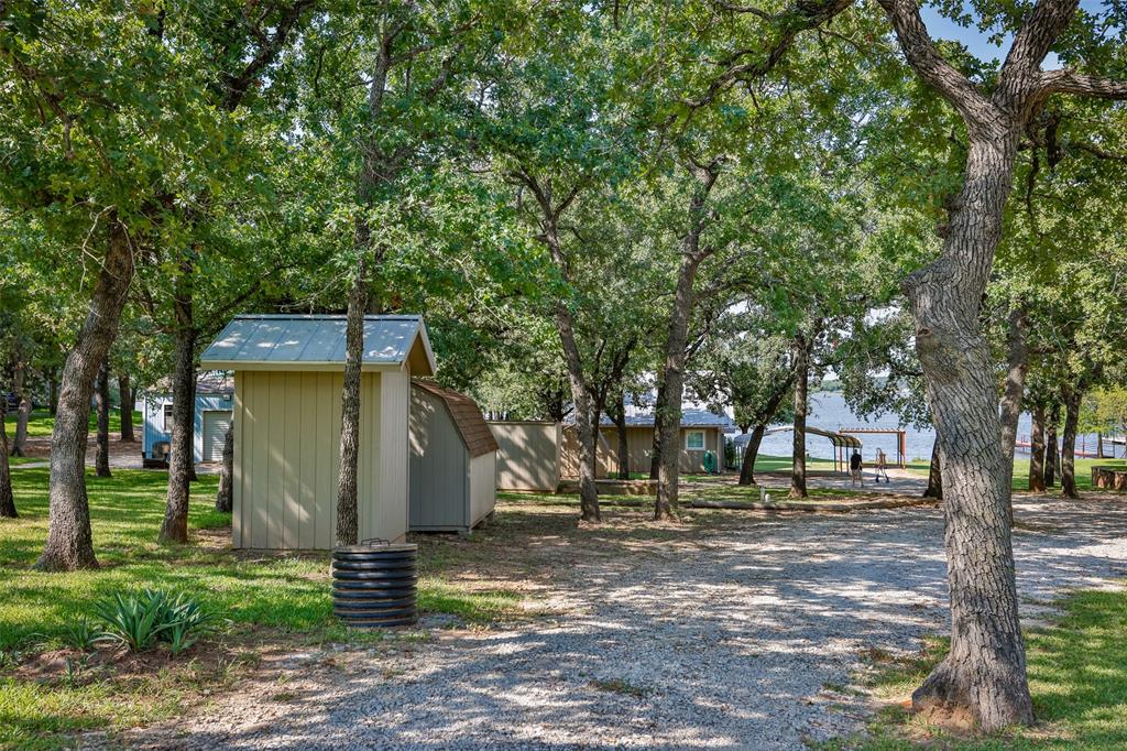823 Casino Road Nocona, TX 76255 - Photo 35 of 40 a view of outdoor space with trees