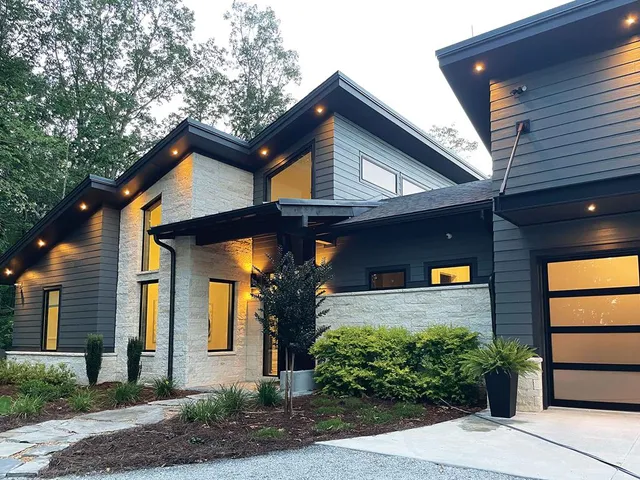 a view of a house with a garage