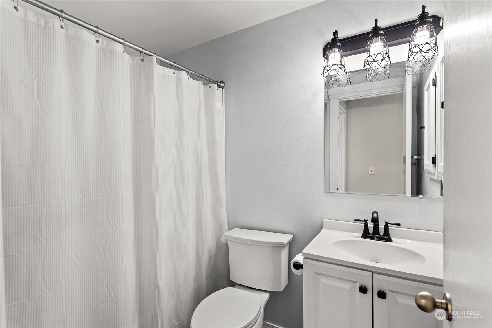 6504 Crestfields Road Yakima, WA 98903 - Photo 12 of 32 a bathroom with a sink a toilet and shower