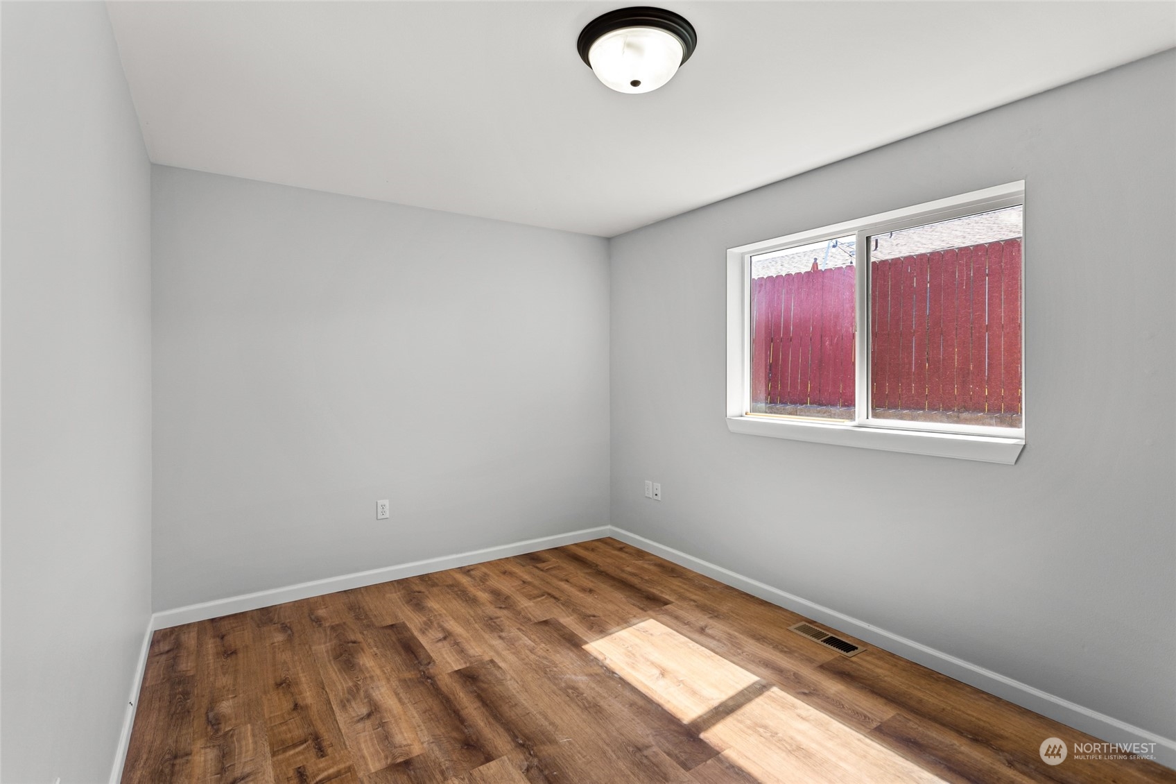 6504 Crestfields Road Yakima, WA 98903 - Photo 13 of 32 a view of a room with wooden floor and fan
