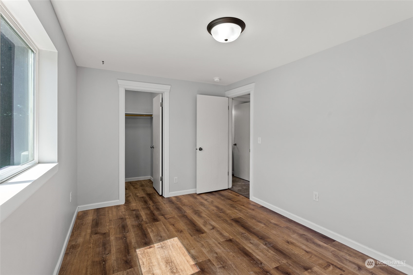 6504 Crestfields Road Yakima, WA 98903 - Photo 14 of 32 a view of a room with wooden floor and a window