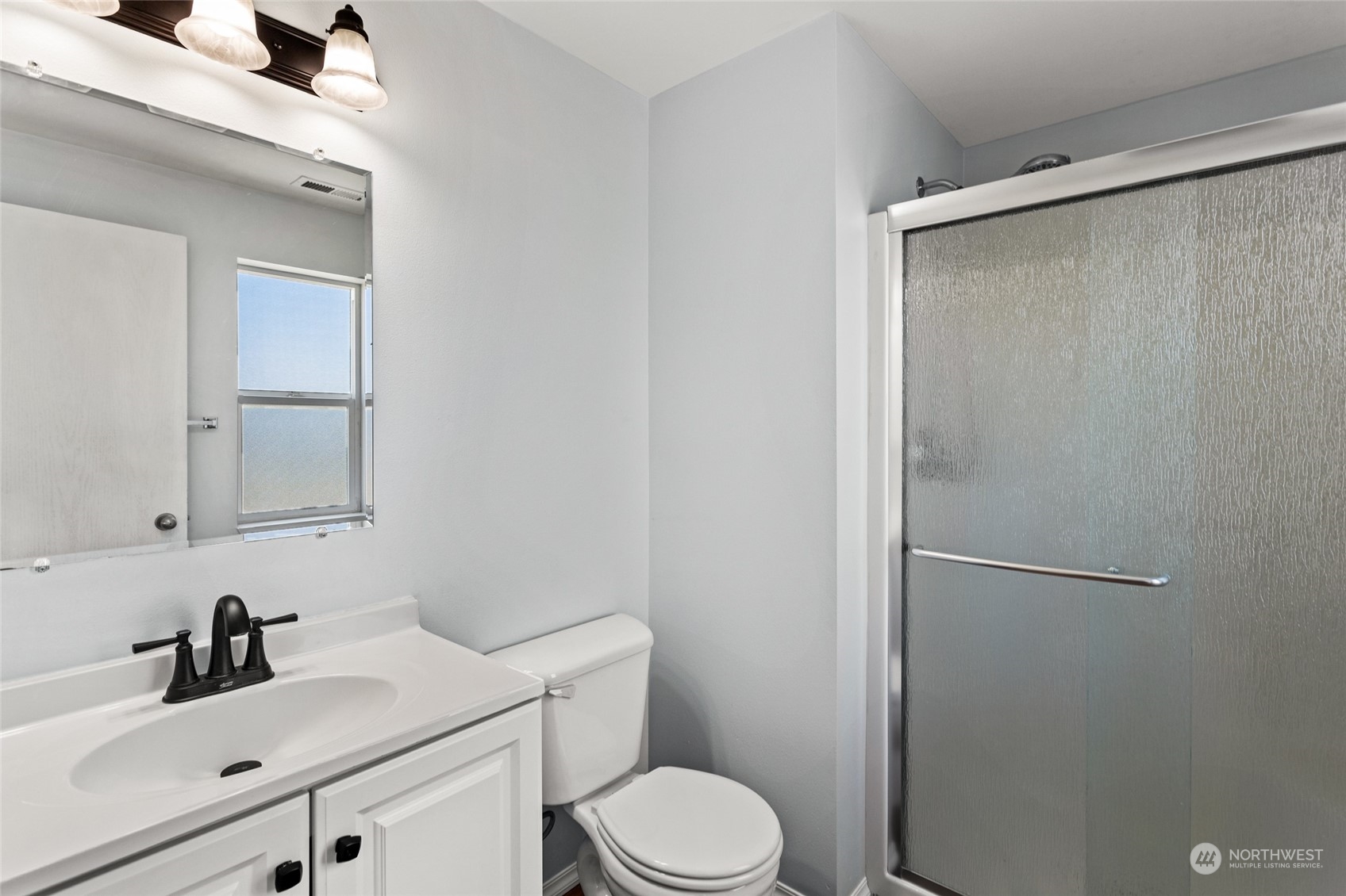 6504 Crestfields Road Yakima, WA 98903 - Photo 18 of 32 a bathroom with a sink toilet and vanity