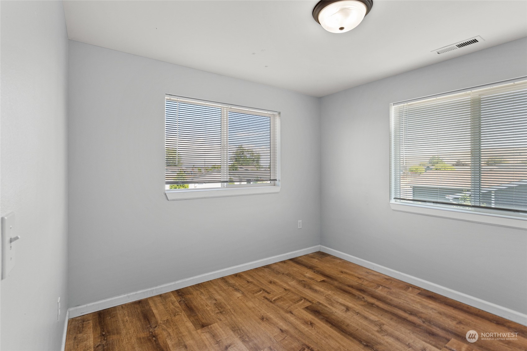 6504 Crestfields Road Yakima, WA 98903 - Photo 23 of 32 a view of empty room with wooden floor and fan