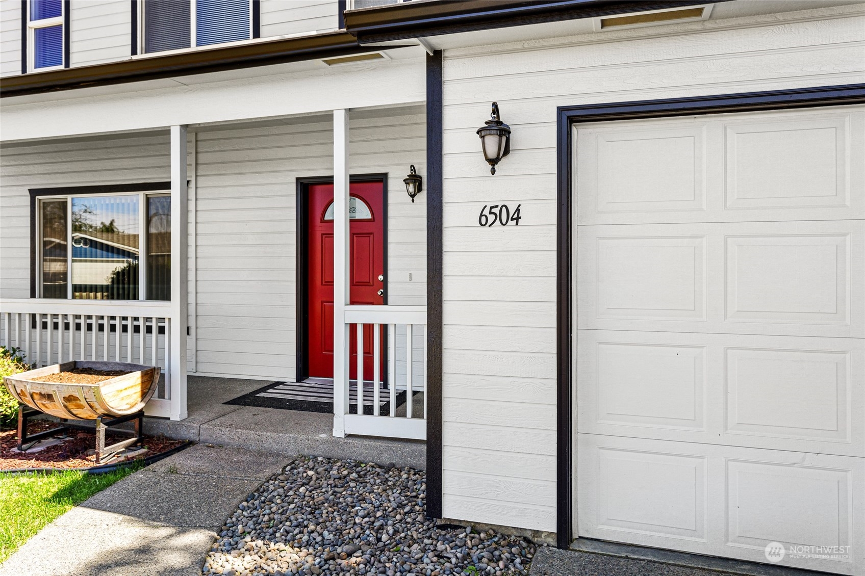 6504 Crestfields Road Yakima, WA 98903 - Photo 30 of 32 a front view of a house with a glass door
