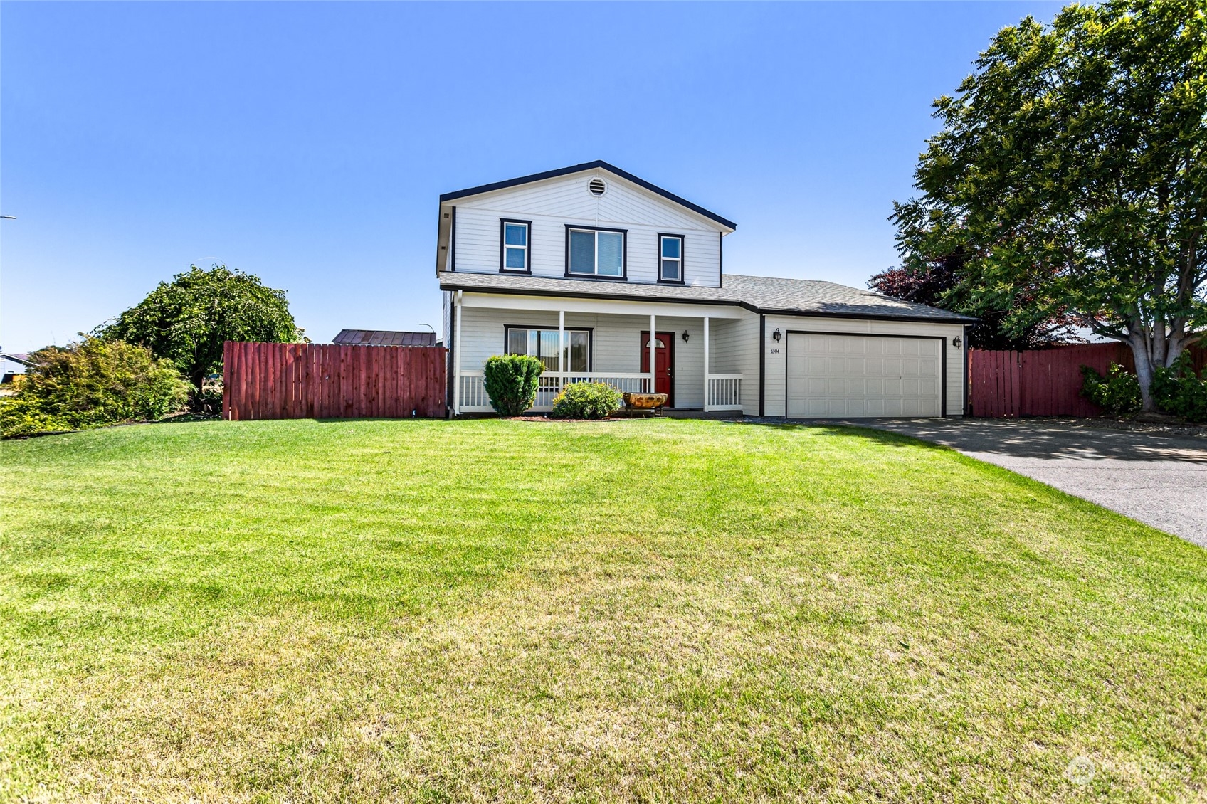 6504 Crestfields Road Yakima, WA 98903 - Photo 32 of 32 a big house with a big yard and more large trees