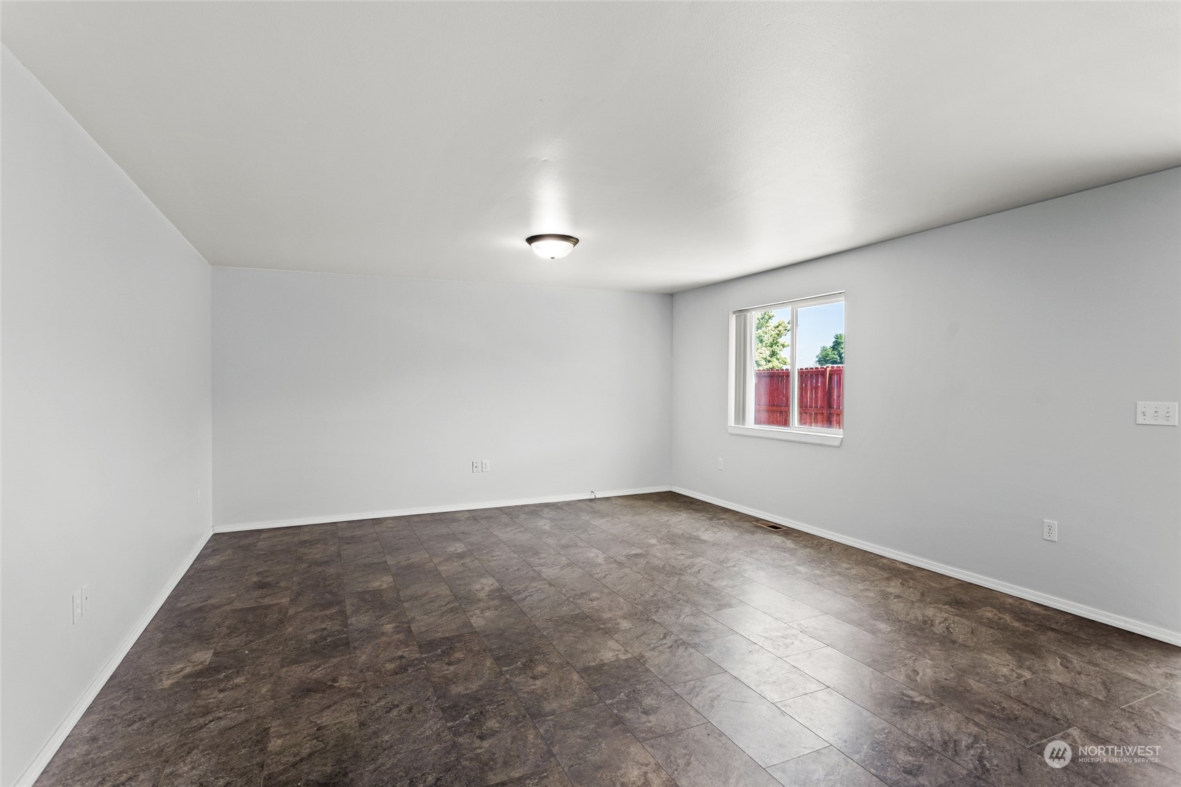 6504 Crestfields Road Yakima, WA 98903 - Photo 8 of 32 an empty room with windows