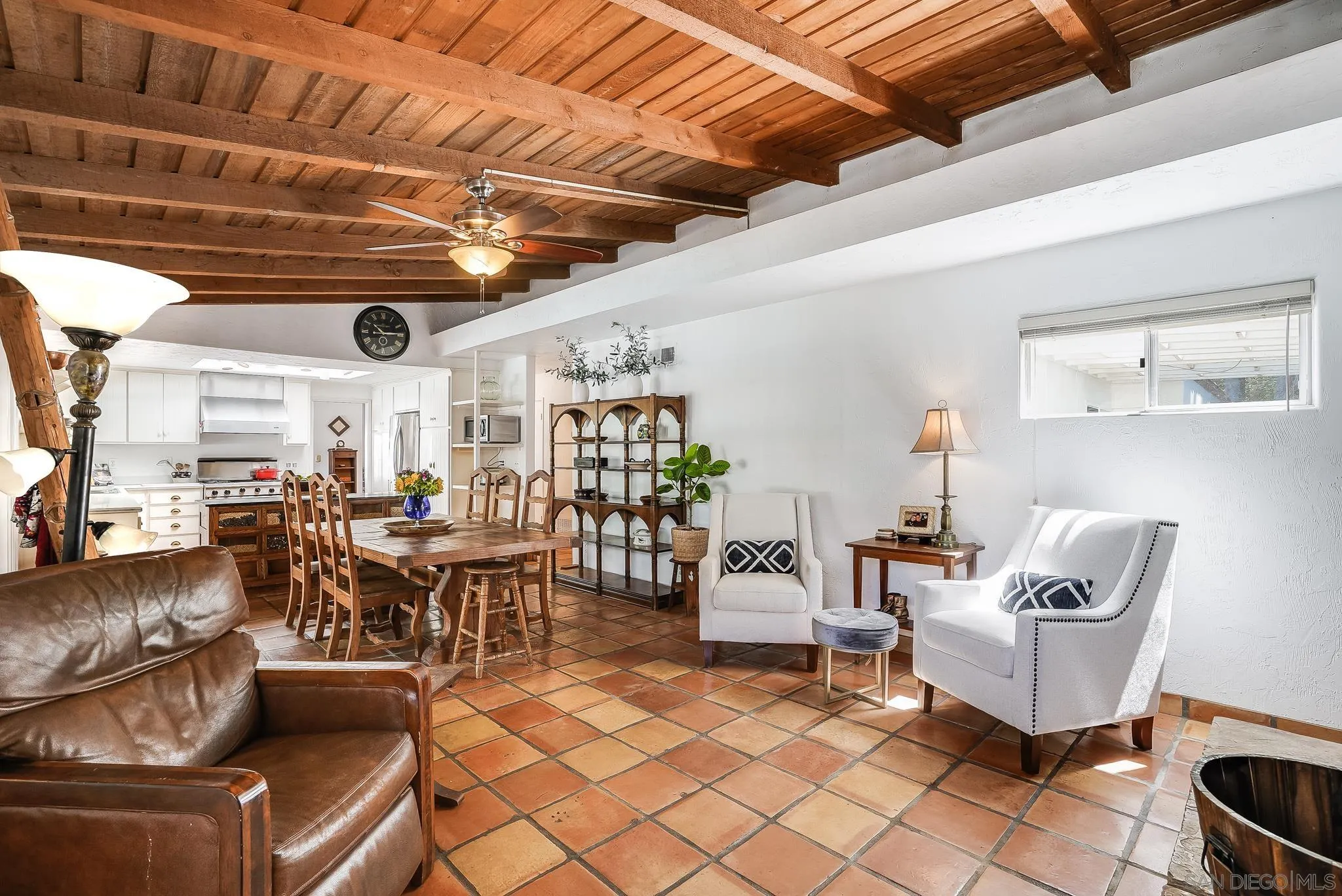 16672 Martincoit Road Poway, CA 92064 - Photo 25 of 71 a living room with furniture and a view of the kitchen