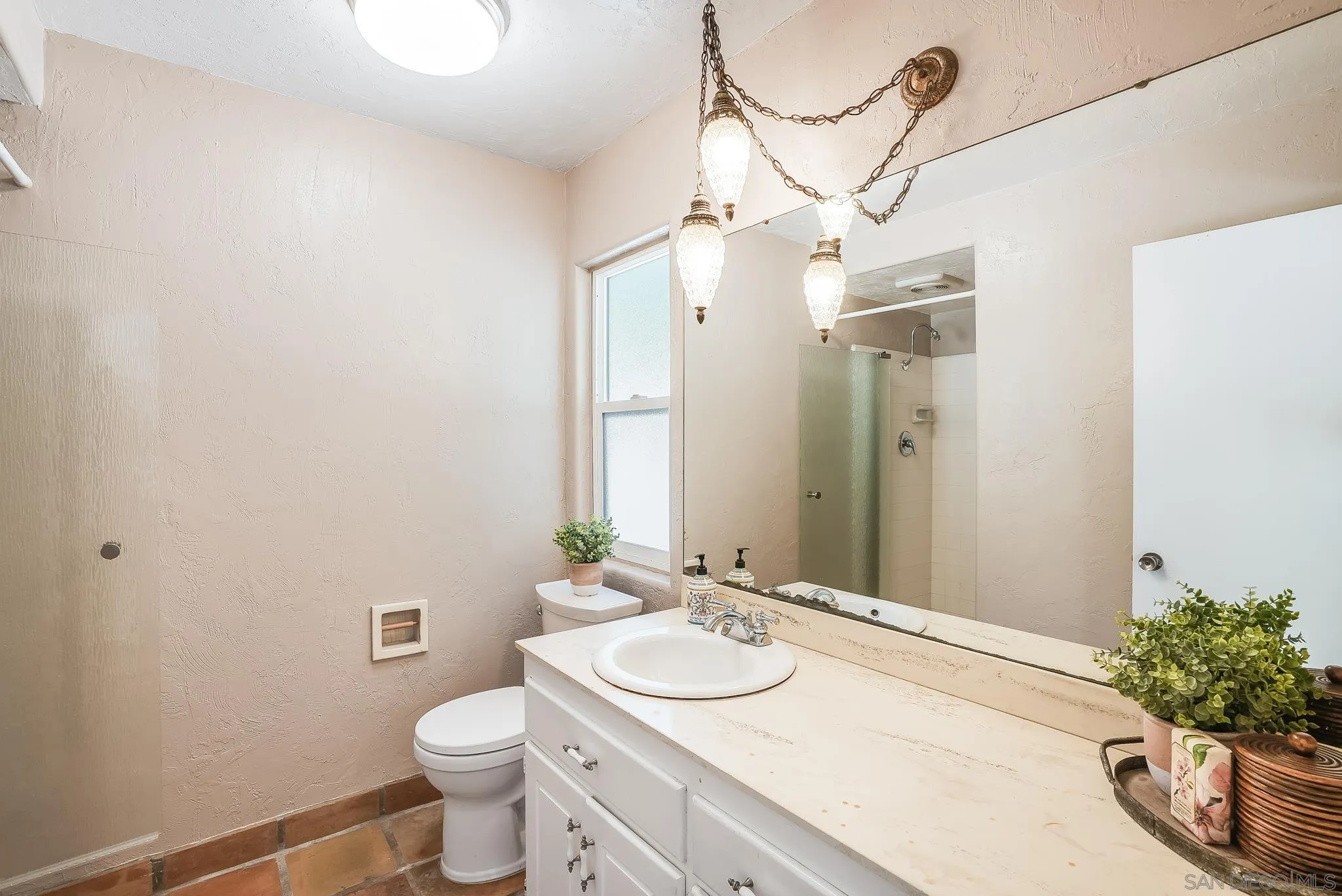 16672 Martincoit Road Poway, CA 92064 - Photo 30 of 71 a bathroom with a sink vanity mirror and toilet