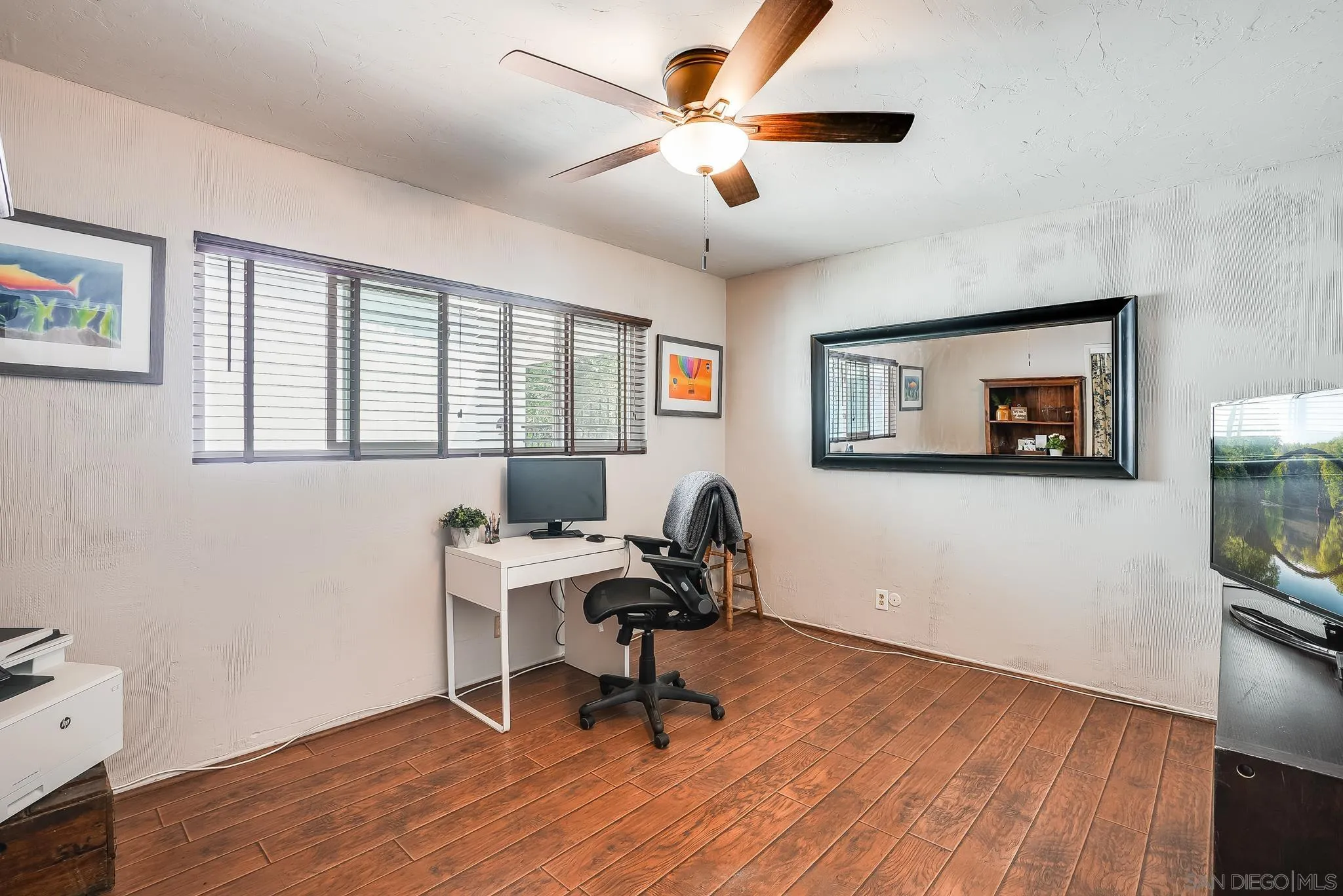 16672 Martincoit Road Poway, CA 92064 - Photo 34 of 71 a workspace with wooden floor and a window