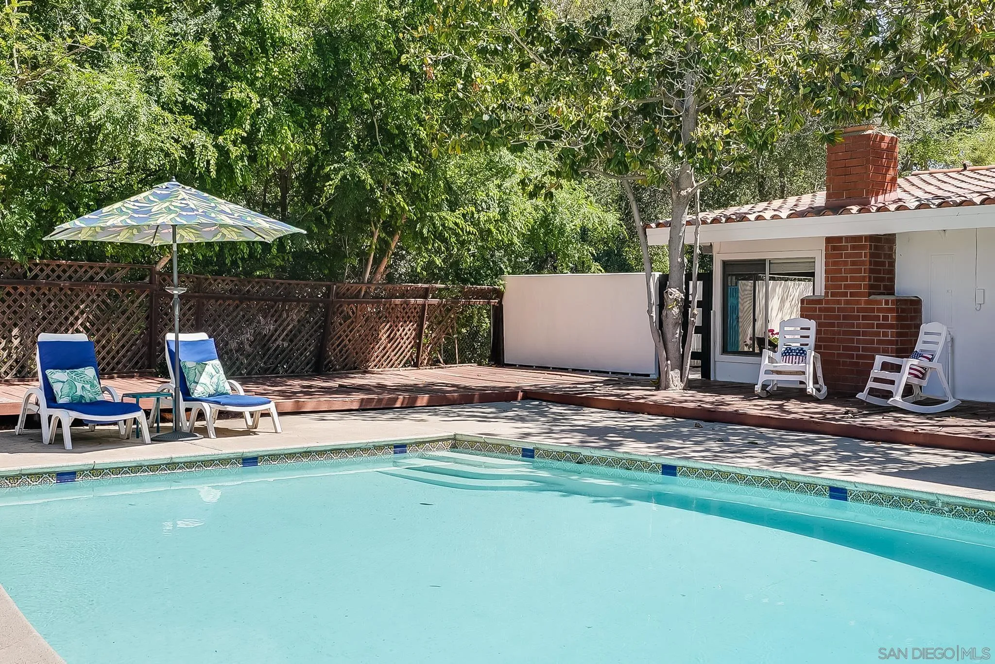 16672 Martincoit Road Poway, CA 92064 - Photo 51 of 71 a view of a house with backyard and sitting area