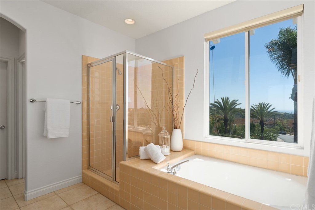 511 Avenida Ossa San Clemente, CA 92672 - Photo 22 of 49 a living room with a large window and front door