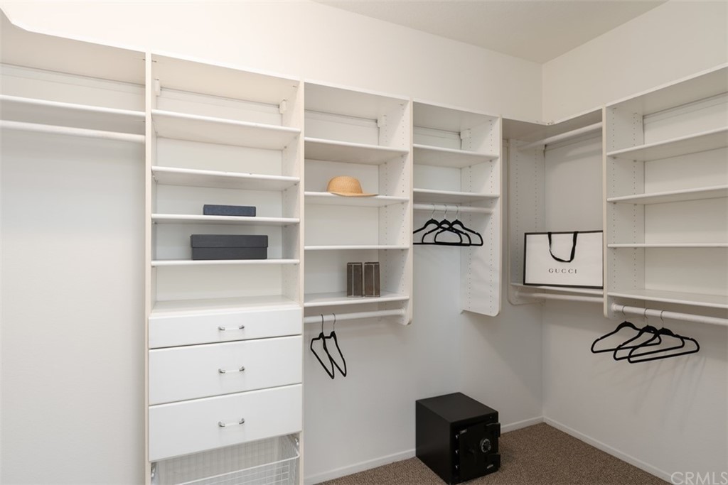 511 Avenida Ossa San Clemente, CA 92672 - Photo 23 of 49 a view of walk in closet with empty racks