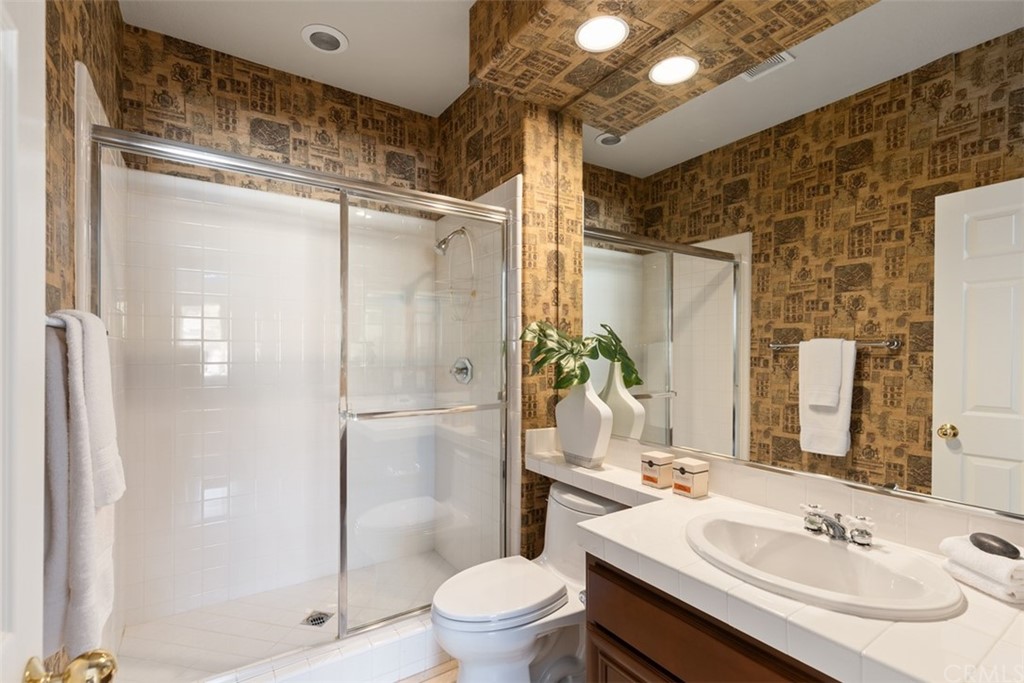 511 Avenida Ossa San Clemente, CA 92672 - Photo 25 of 49 a bathroom with a sink toilet and shower