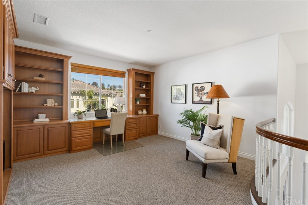 511 Avenida Ossa San Clemente, CA 92672 - Photo 29 of 49 a living room with furniture and a large window
