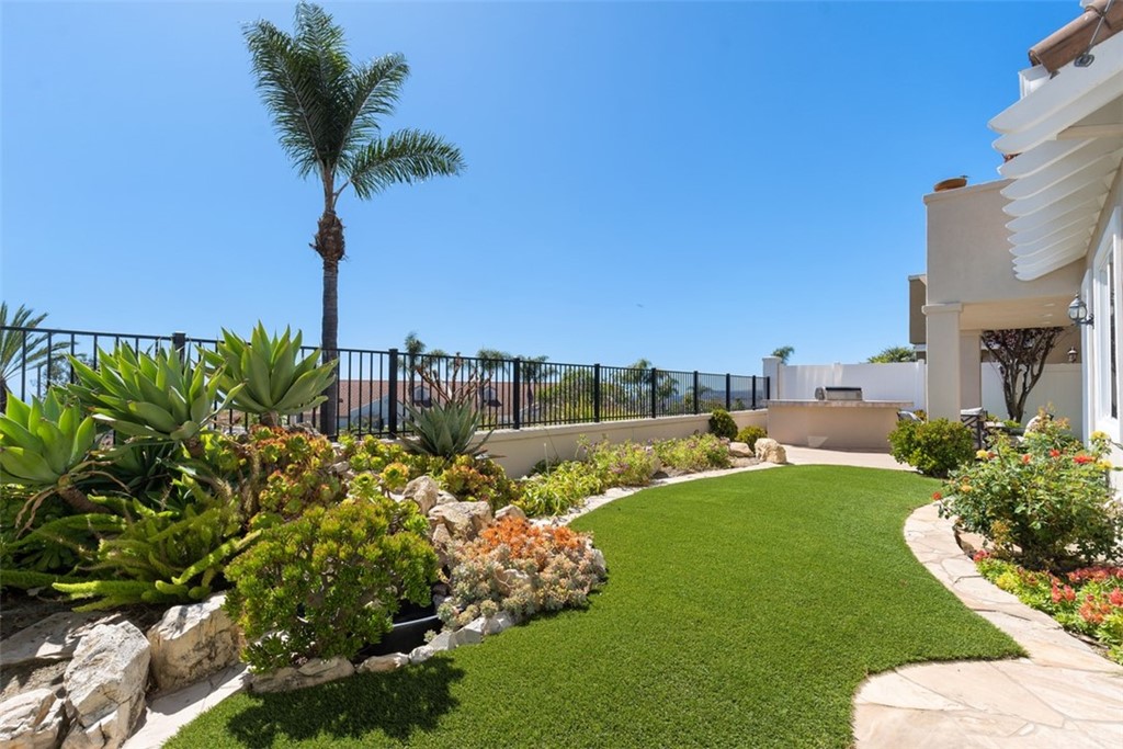 511 Avenida Ossa San Clemente, CA 92672 - Photo 32 of 49 a view of a garden with a fountain
