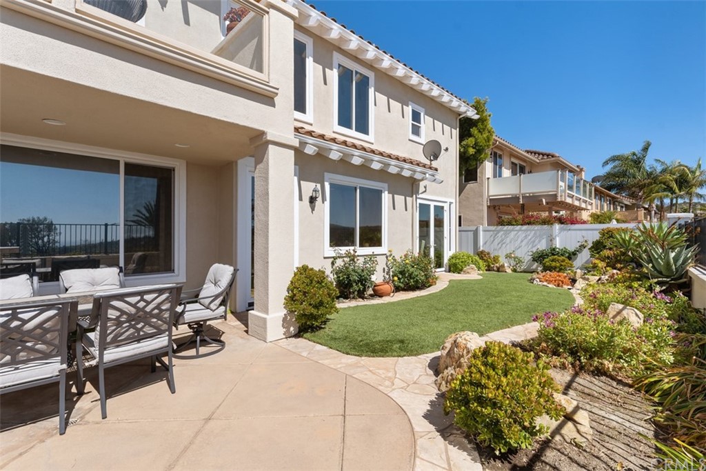 511 Avenida Ossa San Clemente, CA 92672 - Photo 34 of 49 a view of a house with backyard sitting area and garden