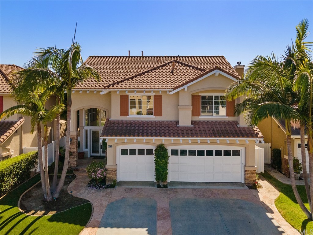 511 Avenida Ossa San Clemente, CA 92672 - Photo 36 of 49 a view of a house with a yard and potted plants