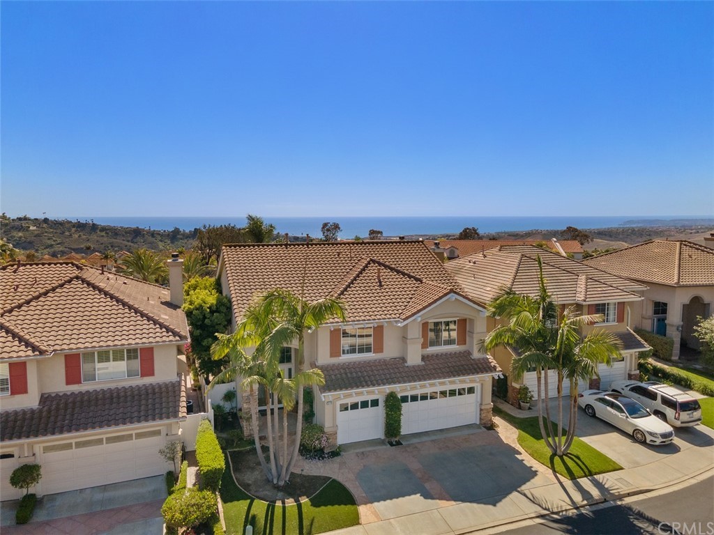 511 Avenida Ossa San Clemente, CA 92672 - Photo 38 of 49 a view of houses with glass top table and chairs