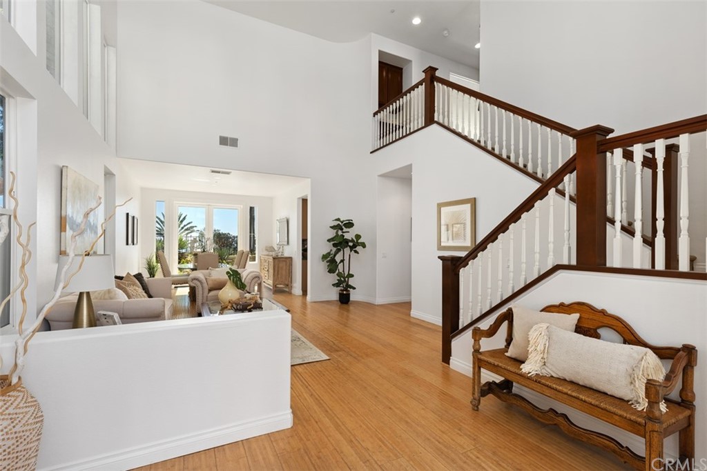 511 Avenida Ossa San Clemente, CA 92672 - Photo 4 of 49 a living room with furniture with wooden floor and a potted plant
