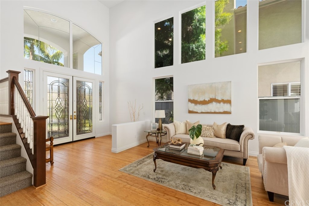 511 Avenida Ossa San Clemente, CA 92672 - Photo 5 of 49 a living room with furniture and a floor to ceiling window