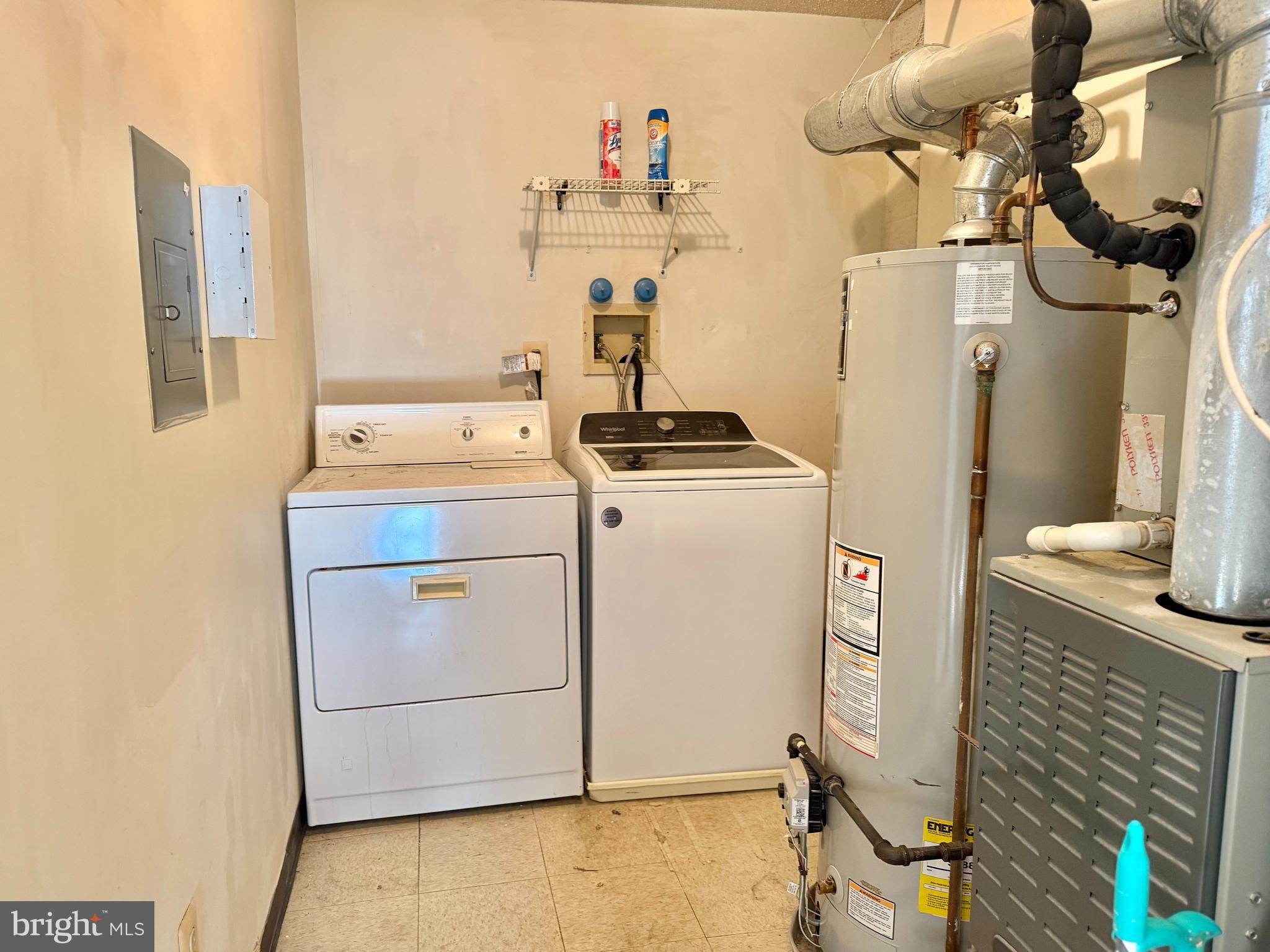82 Versailles Court Hamilton, NJ 08619 - Photo 12 of 16 a utility room with dryer and washer