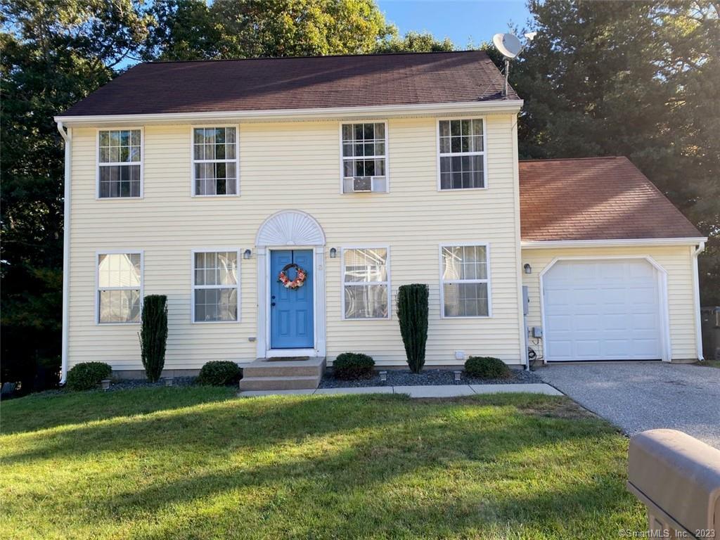 front view of house with a yard