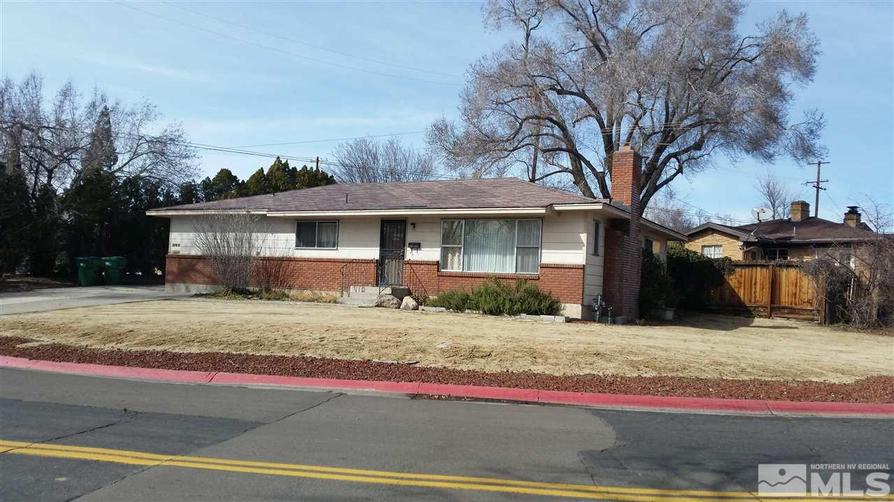 989 Gear Street Reno, NV 89503 - Photo 1 of 1 a view of a house with a tree in front of it