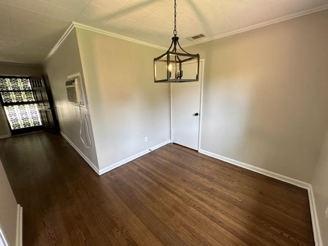 1210 Wilmore Road Memphis, TN 38117 - Photo 6 of 23 a view of empty room with wooden floor and window