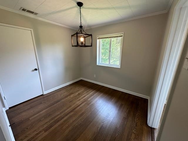 1210 Wilmore Road Memphis, TN 38117 - Photo 8 of 23 a view of empty room with wooden floor and fan