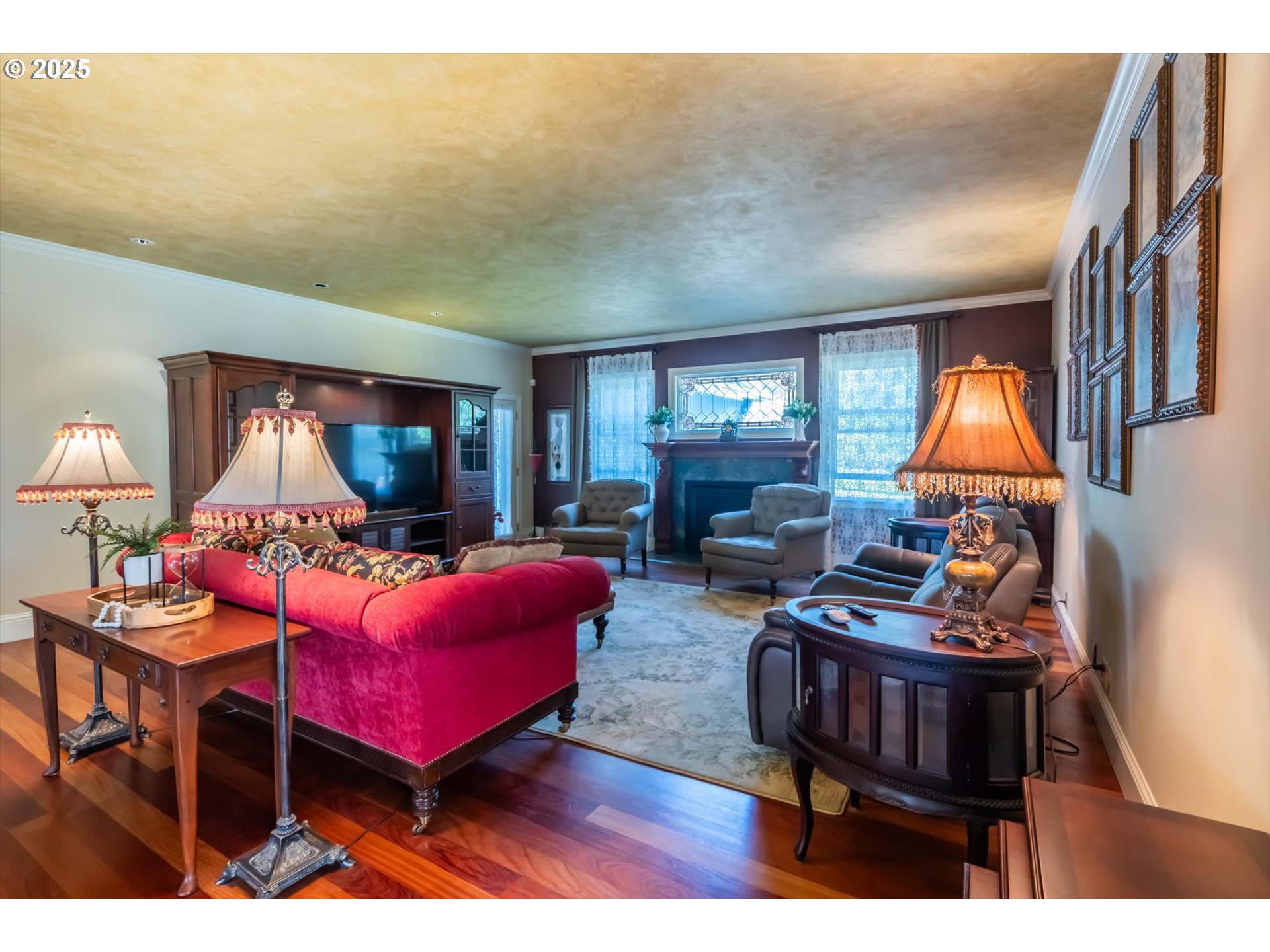 54983 Morrison Road Bandon, OR 97411 - Photo 23 of 29 a living room with furniture a lamp and a potted plant