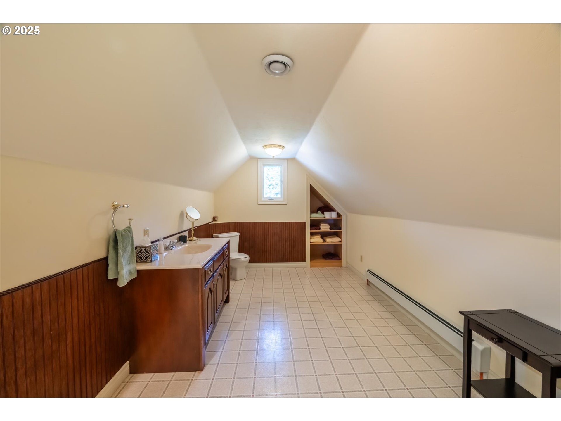 54983 Morrison Road Bandon, OR 97411 - Photo 9 of 29 a open kitchen with cabinets and wooden floor