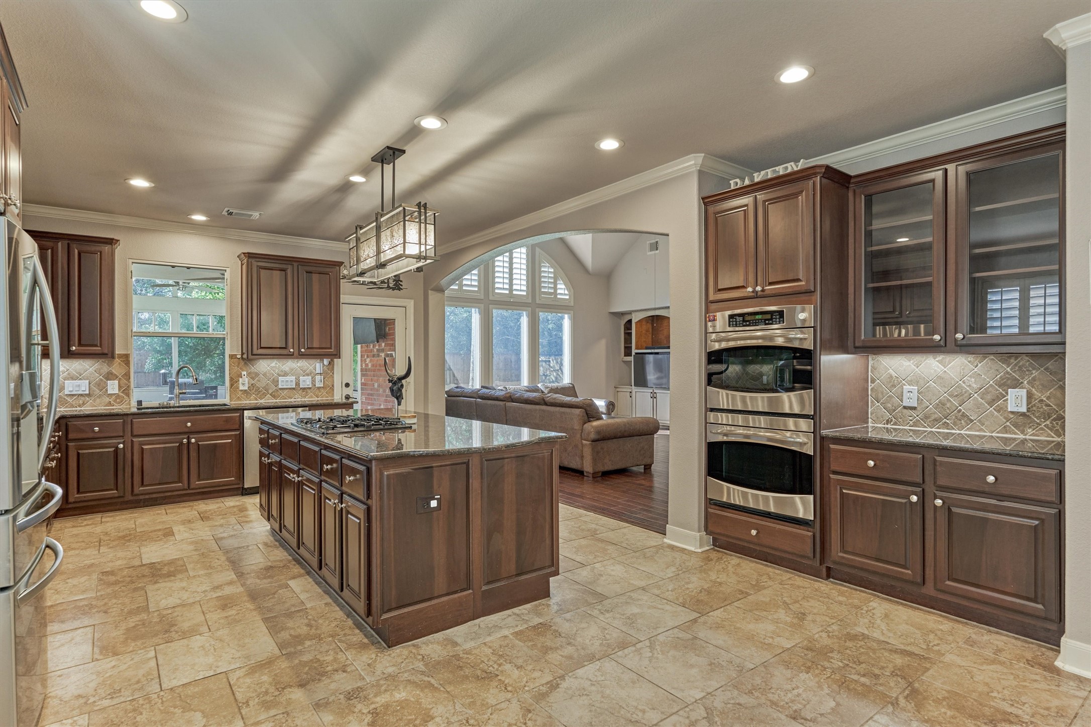 6615 Pelham Chase Drive Spring, TX 77389 - Photo 18 of 49 A view from the breakfast area shows even more counter space for a coffee or serving bar. Double ovens ensure that large meals are ready on time.