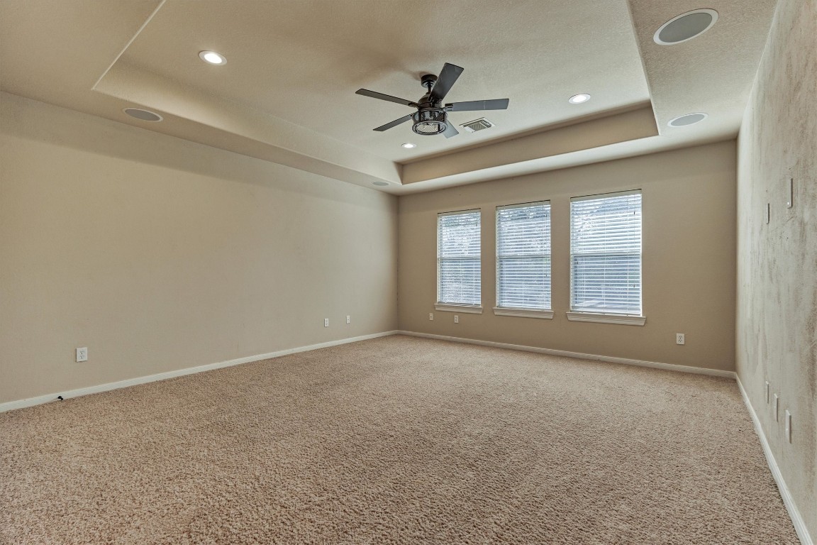 6615 Pelham Chase Drive Spring, TX 77389 - Photo 32 of 49 The spacious game room has a tray ceiling and large windows overlooking the backyard. It features a nice sized storage closet and could also be used as a fifth bedroom, play room, media room or second living space, if desired.