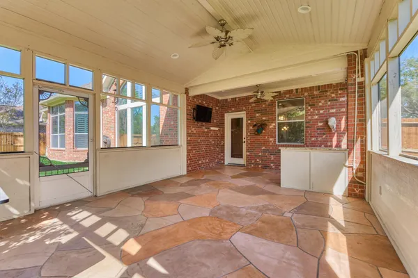 a view of a large window with an outdoor space