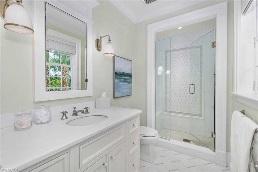 475 South Beach Road Hobe Sound, FL 33455 - Photo 42 of 49 a bathroom with a sink a toilet and shower