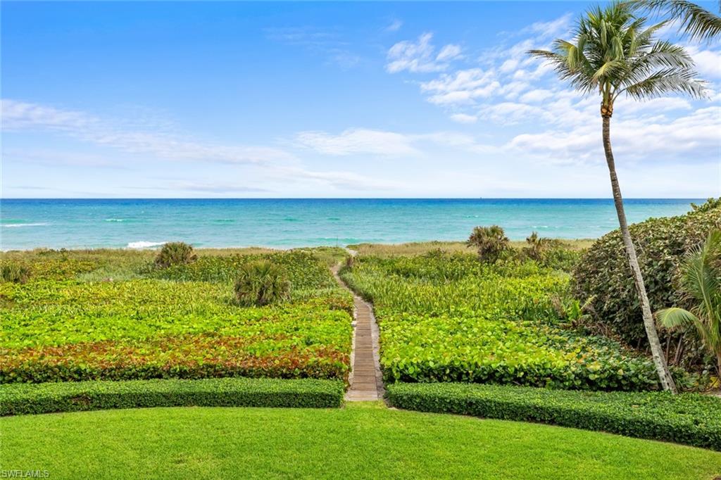 475 South Beach Road Hobe Sound, FL 33455 - Photo 5 of 49 a view of a yard with an ocean view