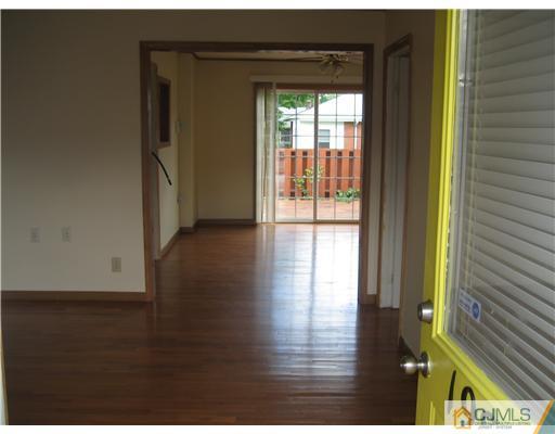 1984 Oak Tree Road Edison, NJ 08820 - Photo 3 of 25 a view of an entryway with wooden floor
