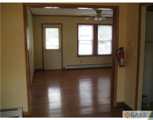 1984 Oak Tree Road Edison, NJ 08820 - Photo 4 of 25 a view of empty room with window