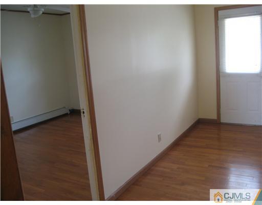 1984 Oak Tree Road Edison, NJ 08820 - Photo 7 of 25 a view of an empty room