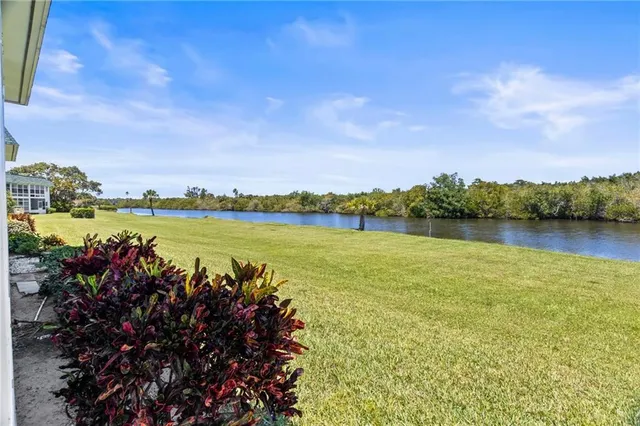 an aerial view of a house swimming pool and outdoor space