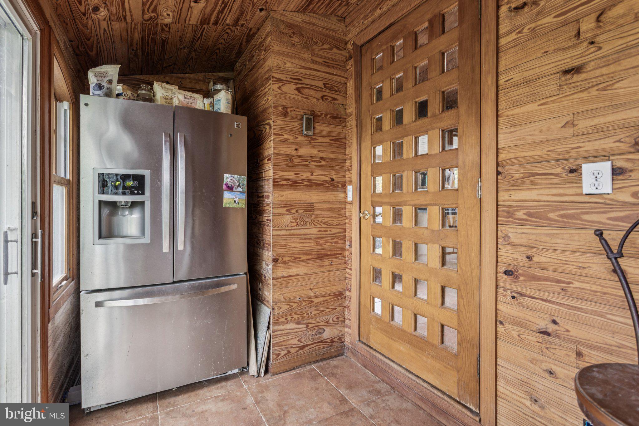 75 Piercetown Road Millville, NJ 08332 - Photo 17 of 49 a metallic refrigerator freezer sitting in a kitchen
