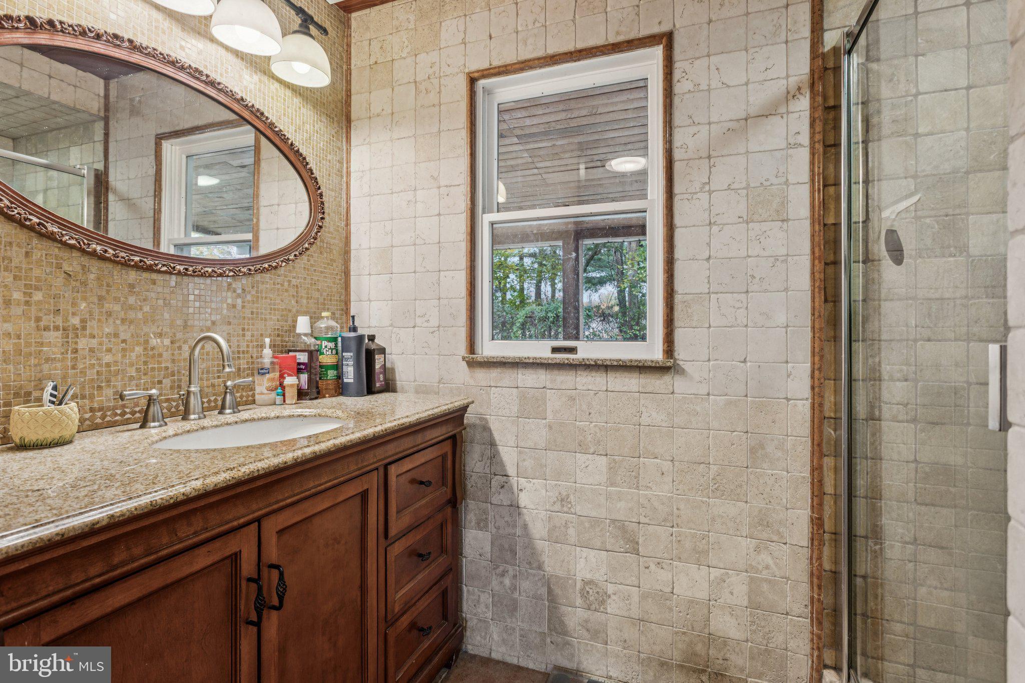 75 Piercetown Road Millville, NJ 08332 - Photo 20 of 49 a bathroom with a sink and a mirror