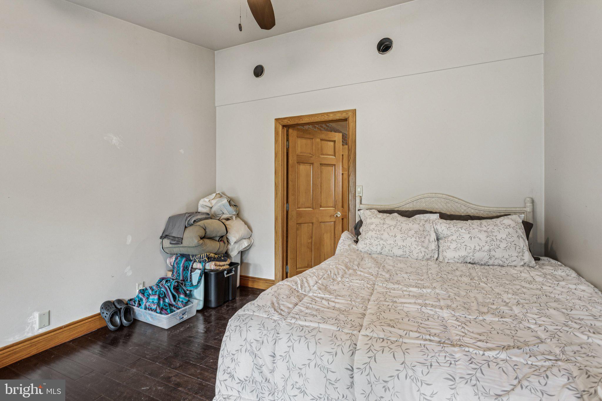 75 Piercetown Road Millville, NJ 08332 - Photo 23 of 49 a bedroom with a bed and wooden floor