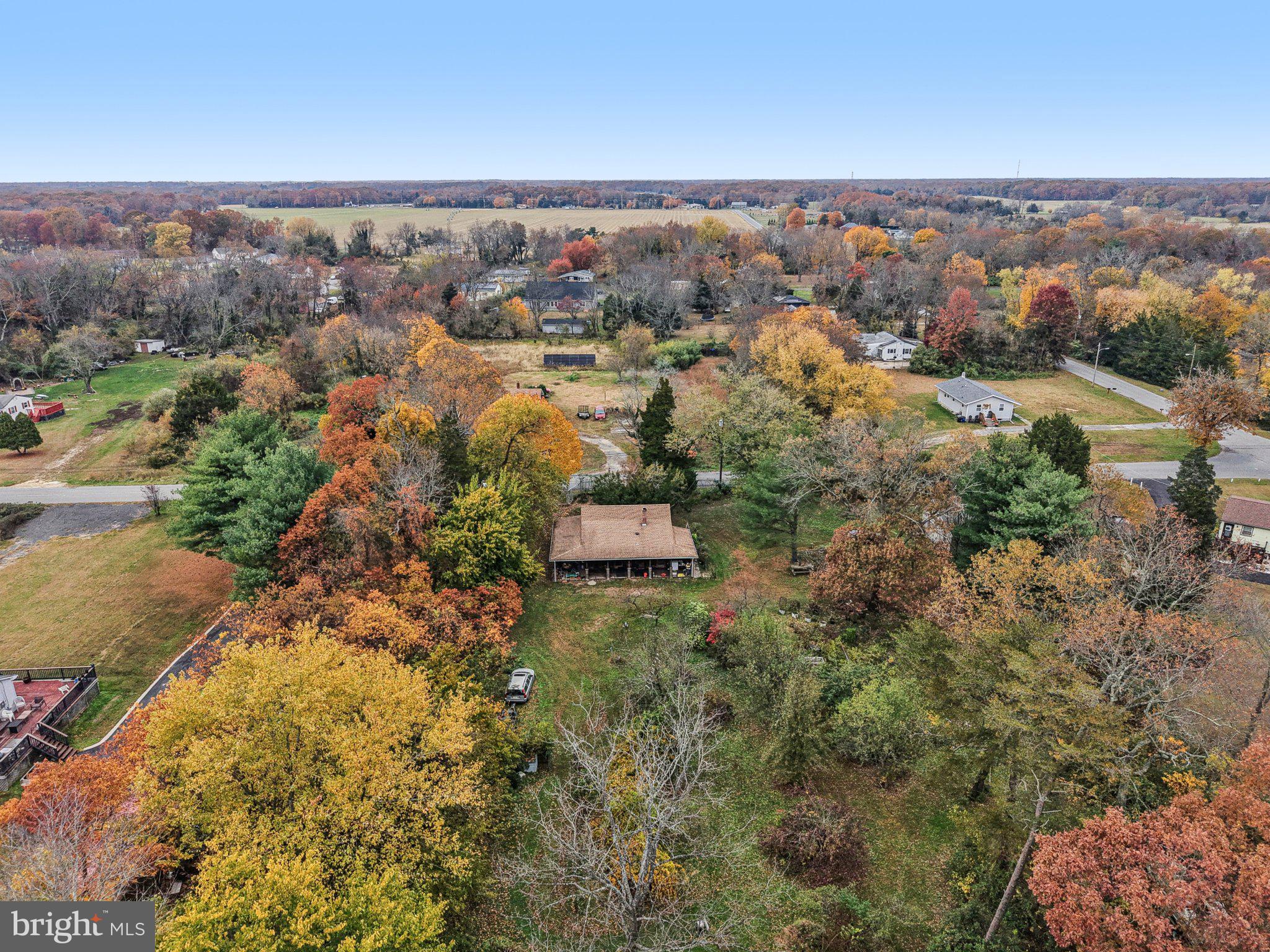75 Piercetown Road Millville, NJ 08332 - Photo 48 of 49 an aerial view of a house with a yard and lake view