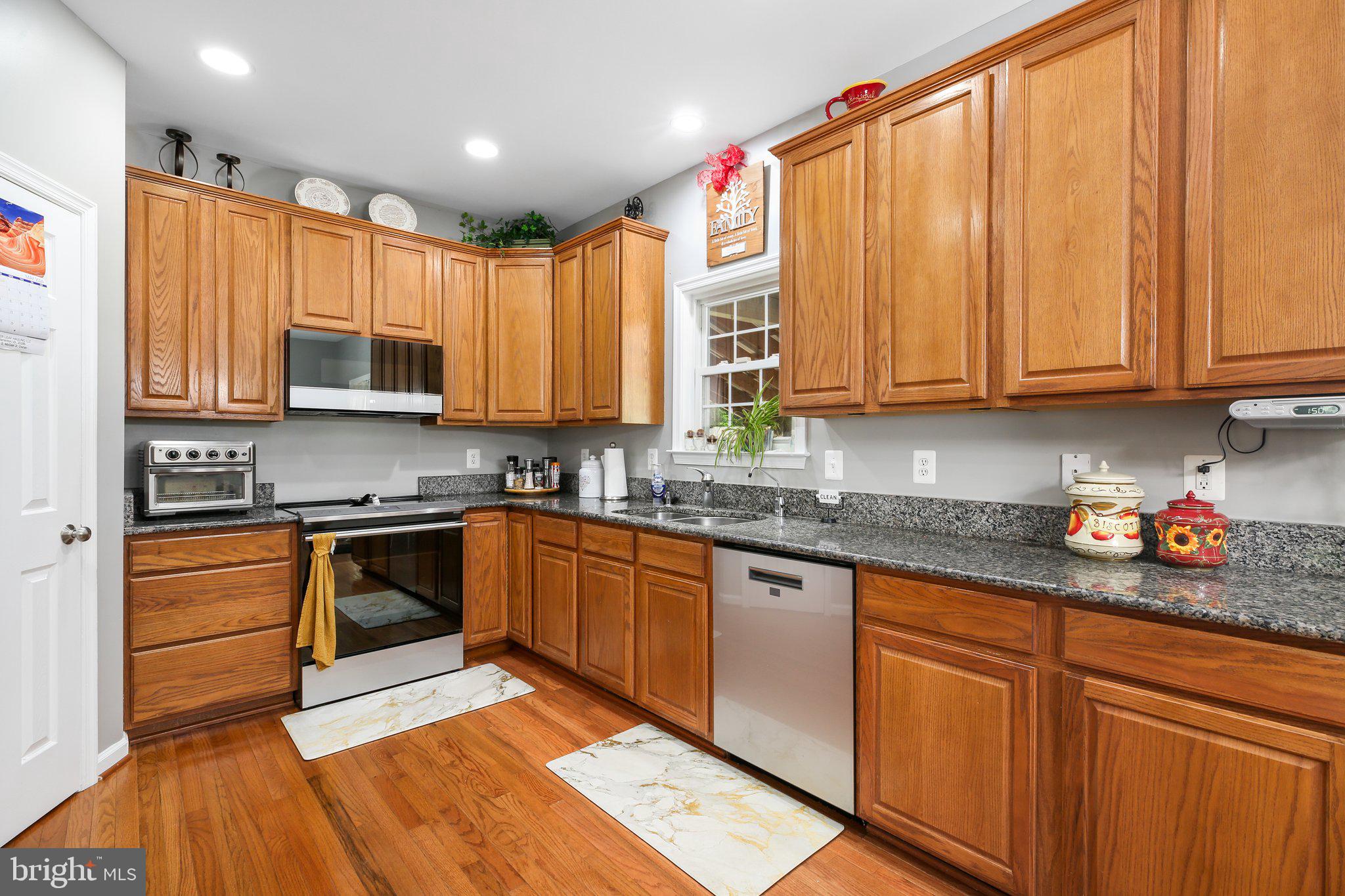 13249 Kendall Road Orange, VA 22960 - Photo 9 of 61 Raised Paneled Wood Cabinets and Granite Counters