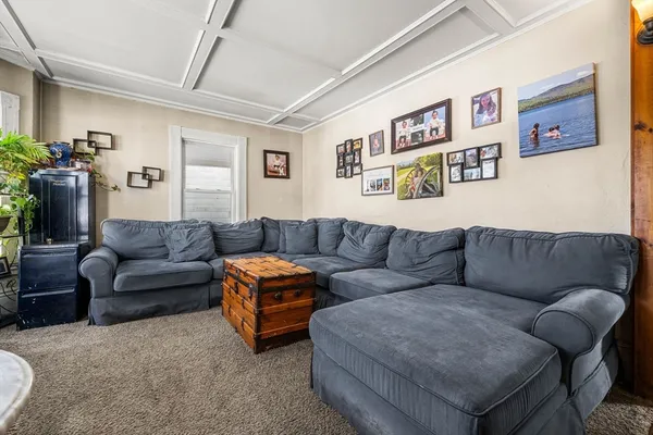 a living room with furniture and a couch