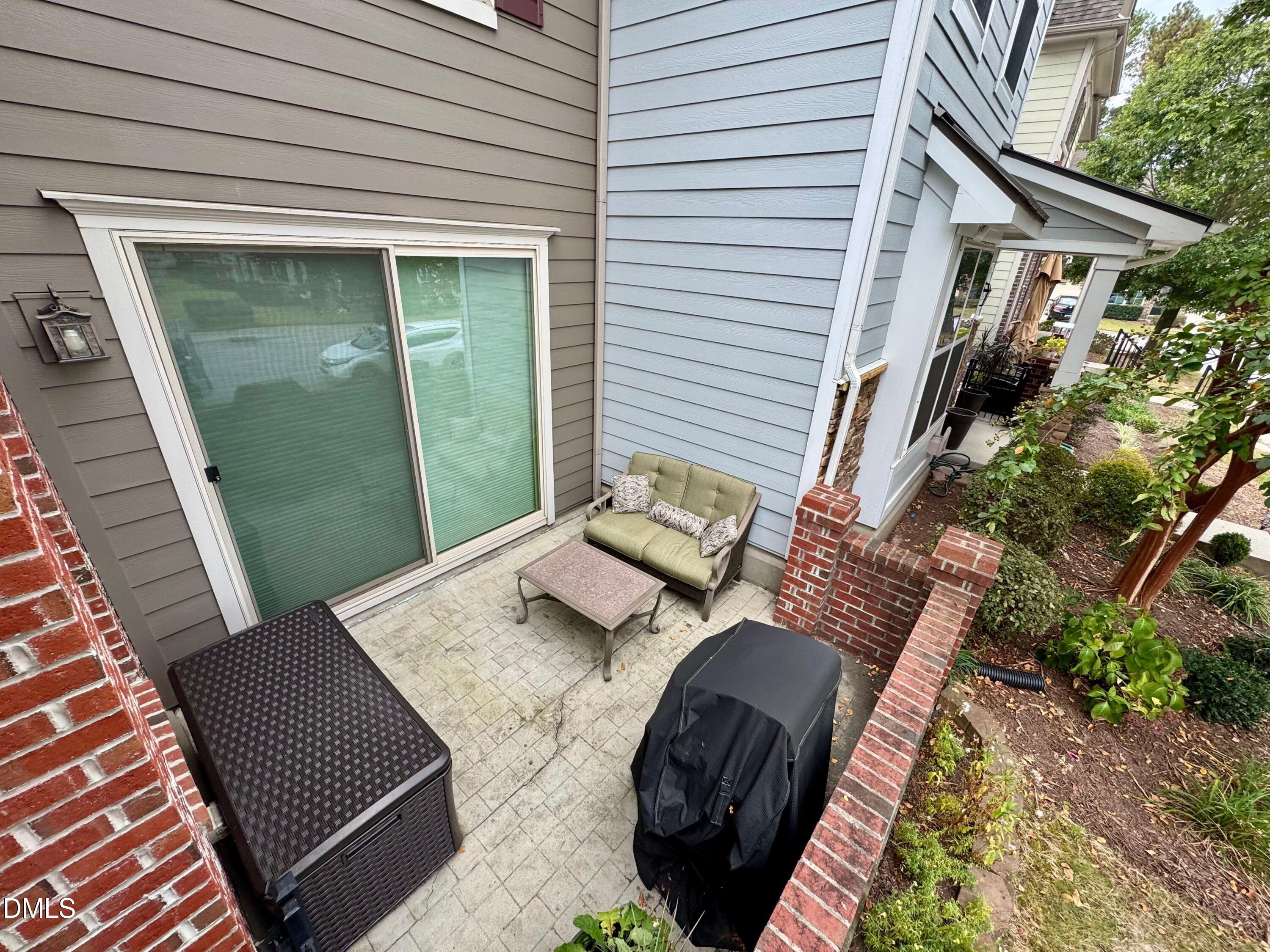 9302 Alcazar Walk Raleigh, NC 27617 - Photo 12 of 40 a view of a backyard with furniture