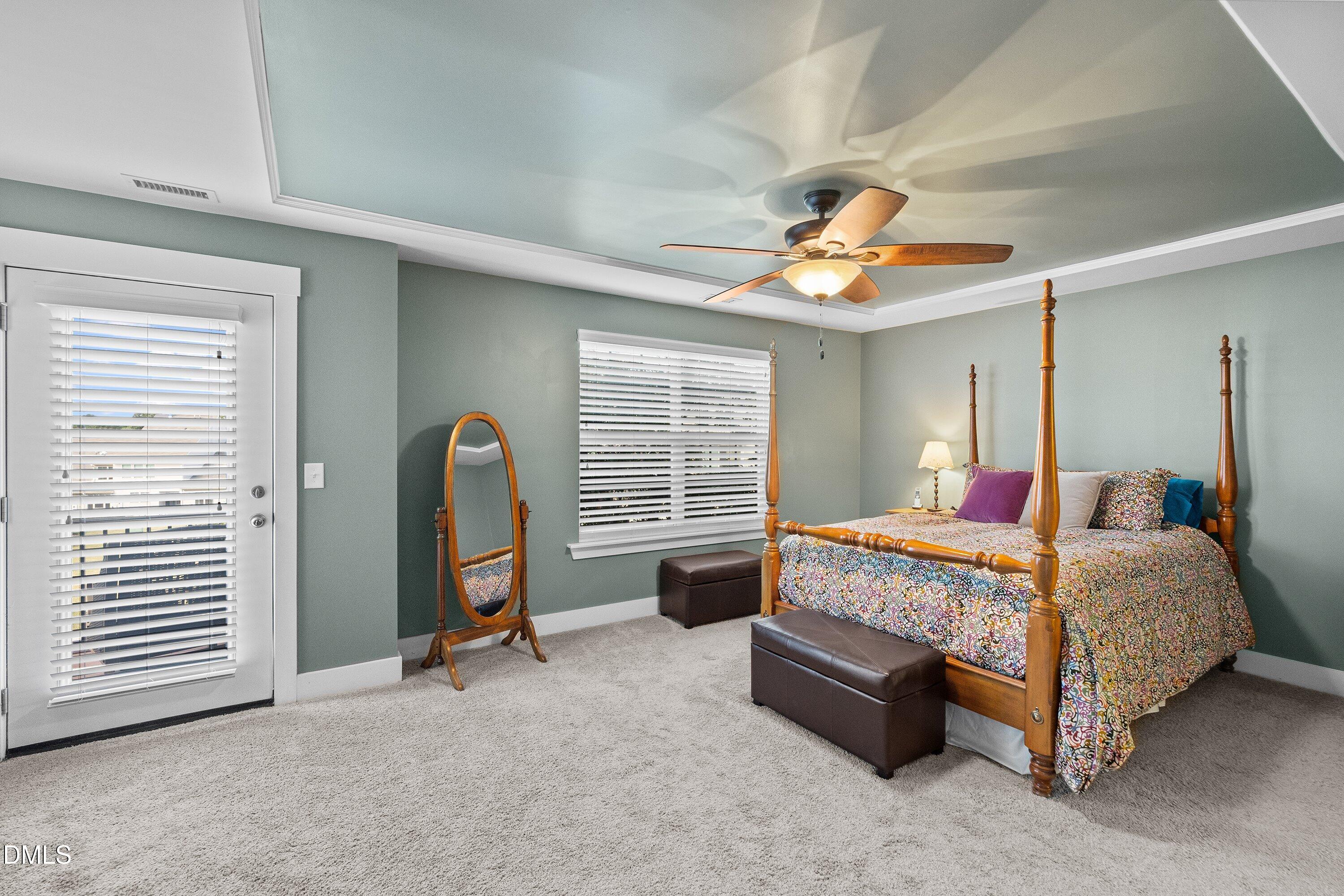 9302 Alcazar Walk Raleigh, NC 27617 - Photo 18 of 40 a bedroom with bed and window