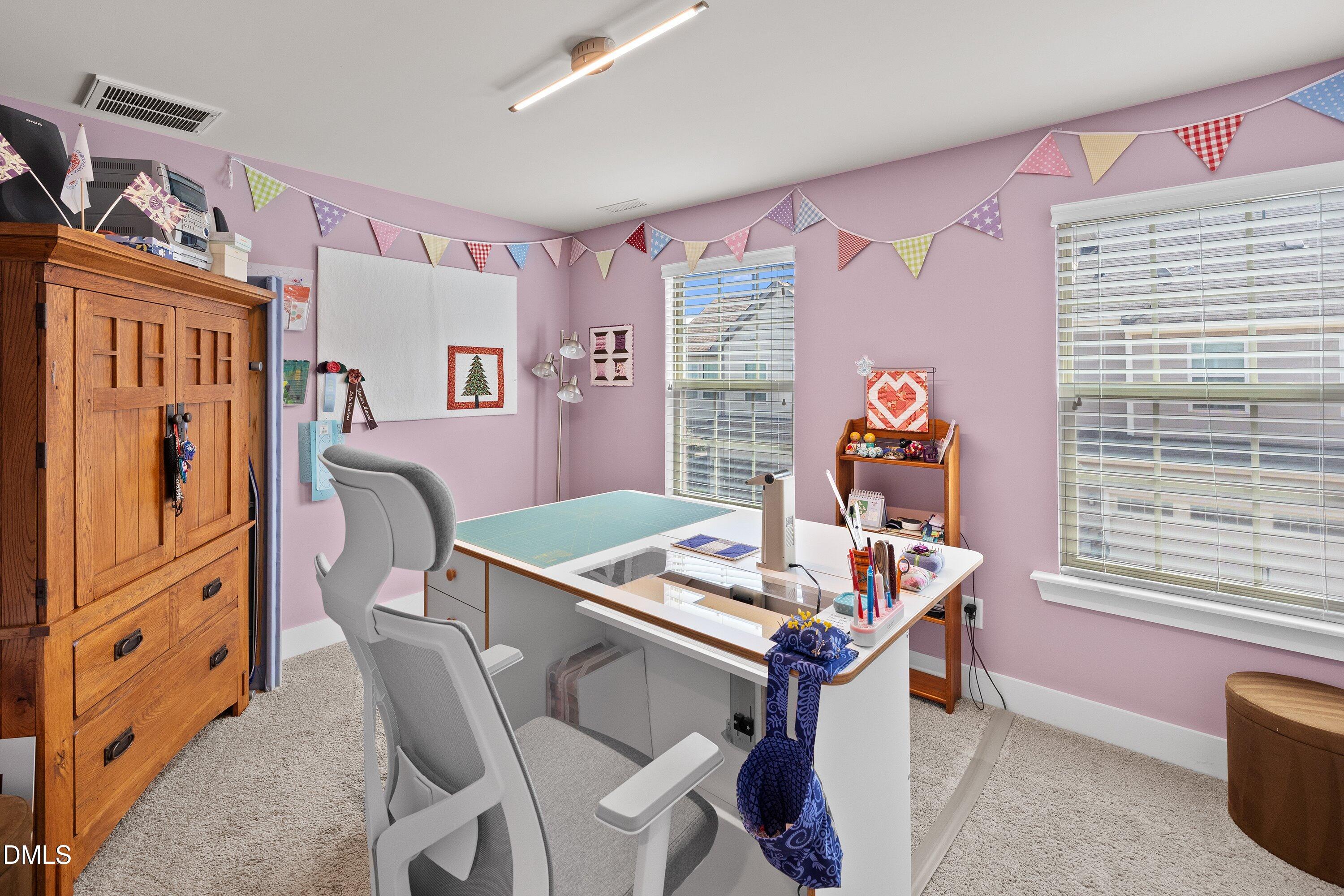 9302 Alcazar Walk Raleigh, NC 27617 - Photo 24 of 40 a view of a dining room with furniture window and outside view