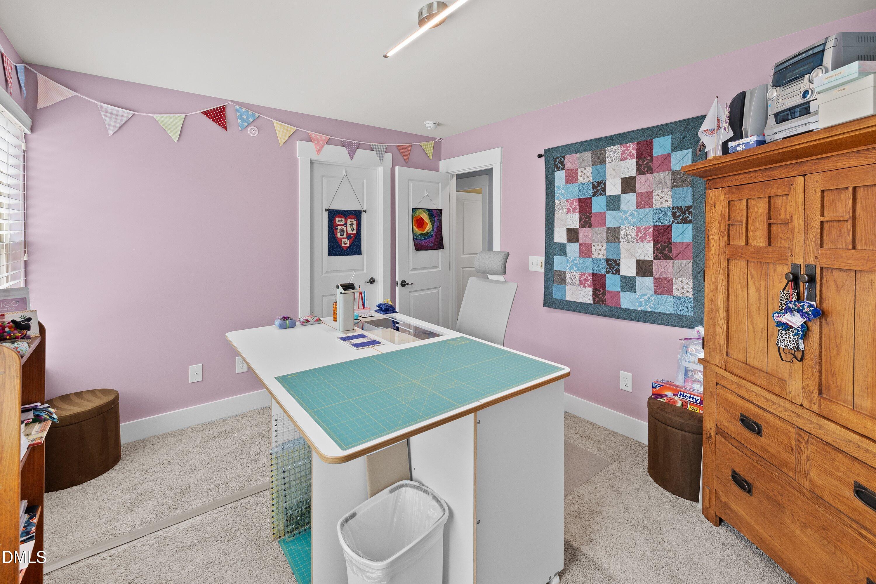 9302 Alcazar Walk Raleigh, NC 27617 - Photo 25 of 40 a kitchen that has a sink and a stove in it